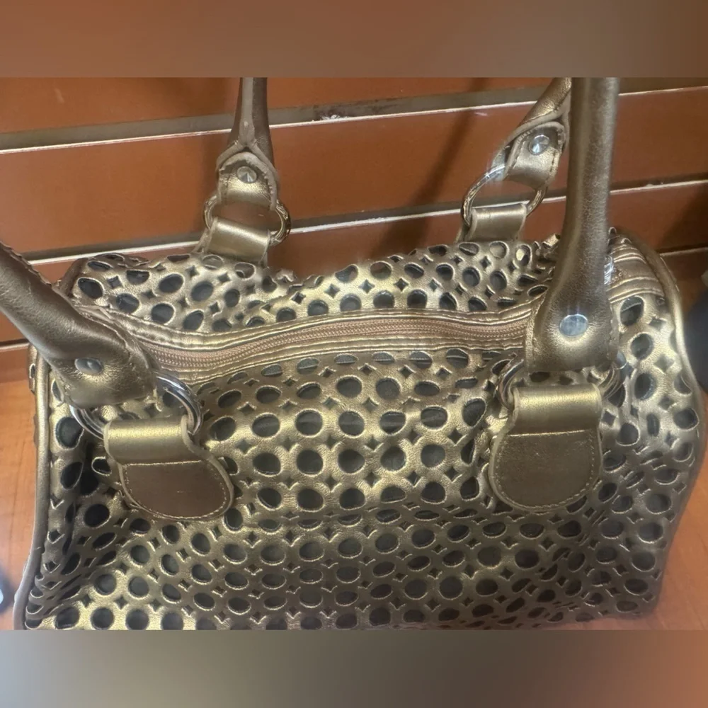 Elegant Metallic Satchel with Perforated Design